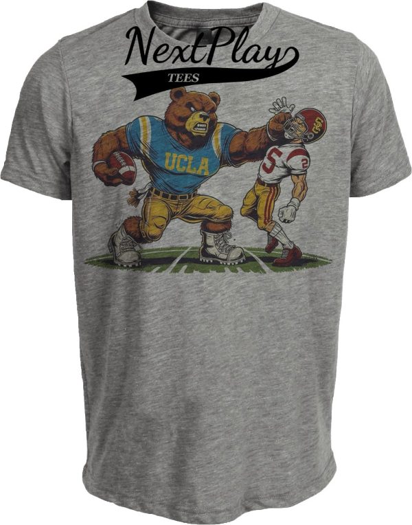 UCLA Bruins vs. USC Trojans Exclusive Retro Rivalries Football Knock Out Artwork Heather Gray Sublimated T-Shirt